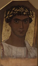 Ein junger Mann mit einem goldenen Kranz